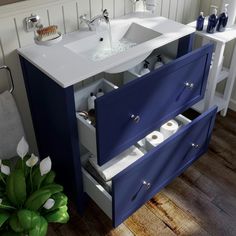 a bathroom vanity with two drawers and a sink