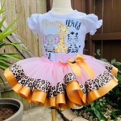 Young Wild and Three INCLUDES *1 Full Tutu *Embroidered Shirt or Bodysuit Choose the size your child is currently wearing. Do not upsize. The shirts do run on the bigger side. SHIRT BRANDS ** 12M - 18M -2t 3t 4t 5t -ARB blanks or Blanks Boutique brand (depending on the availability at time of making) BODYSUITS **6-12m, 12m, 18m, 24m - ARB Blanks or Carter's brand (depending on the availability at time of making) **TUTU LENGTHS 12-2T -- (7 INCHES LONG) 3T------(8 INCHES LONG) 4T-5T---(9 INCHES LO Wild And Three Birthday Girl, Safari Birthday Outfit, Wild Two Birthday Shirt, Pink Safari Tutu, Two Wild Birthday Party Girl Shirts, Wild One Birthday Outfit, Young Wild And Three Shirt, Young Wild And Three Birthday, Third Birthday Girl