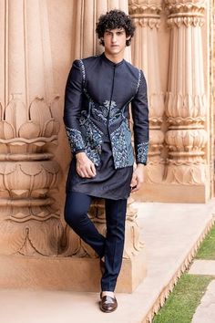 Navy blue bandhgala featuring multi-color botanical pattern thread hand embroidery. Paired with a kurta and a pant. - Aza Fashions Designer Embroidered Fitted Bandhgala, Fitted Bandhgala With Embroidered Sleeves For Eid, Formal Fitted Bandhgala With Embroidered Sleeves, Fitted Kurta With Embroidered Sleeves And Traditional Drape, Designer Fitted Bandhgala With Intricate Embroidery, Designer Embroidered Fitted Nehru Jacket, Fitted Nehru Jacket With Floral Embroidery For Diwali, Formal Fitted Sherwani With Embroidered Sleeves, Festive Fitted Sherwani With Embroidered Sleeves