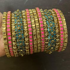 Enhance your beauty with handmade Bridal jewelery. VClassy gives a perfect Silk thread and Kundan design bangles for all your special occasions. It's a perfect gifting option for wedding, housewarming ceremony, baby shower, return gift.  We provide a wide range of Silk thread jewellery in different categories in attractive colors and design with finest finishing. Handmade Kundan Silk Thread Bangle | Indian Jewelry - 2 Set (Each set has 7 bangles - 1 middle bangle, 6 side bangles) Product colour Handmade Rectangular Jewelry For Festive Occasions, Pink Kundan Bangle For Gift, Adjustable Meenakari Bangle As Gift, Fusion Style Openable Bracelets As Gift, Fusion Style Openable Bracelet For Gift, Fusion Openable Bracelet For Gift, Adjustable Rectangular Jewelry For Wedding, Handmade Square Pink Jewelry, Handmade Pink Square Jewelry