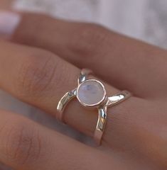 Cutest Rainbow Moonstone Ring - 925 Sterling Silver Ring - Double Layer Ring  - 8x8 mm - Dainty Faceted Gemstone Ring - Jewelry For Love This Sterling Silver Moonstone Ring is perfect as a gift item, for you and especially your loved ones. We Also Accept Wholesale Or Orders And All Kinds Jewelry & Gemstones Re Available In Small And Bulk Quantity. For Any Query Please Contact Us. * All our jewelry is Micron Plated which is higher quality as compared to Standard Plating * Please note that there will be slight variations in stone texture and color shades in the actual product that you receive. Stone quality or grade will be same. Product Info  Gemstone --Rainbow Moonstone  Size -- 8x8 MM. Metal -- 925 Sterling Silver Stone Color - Blue Band Color - As Your Wish SHIPPING POLICY .After Receipt Silver Stackable Jewelry With Round Stones, Silver Opal Promise Ring, Silver Round Opal Promise Ring, Silver Moonstone Promise Ring In Fine Jewelry Style, Silver Gemstone Ring With Open Band, Silver Open Band Ring With Gemstone, Silver Moonstone Ring With Birthstone, Silver Moonstone Birthstone Ring, Unique Silver Solitaire Jewelry