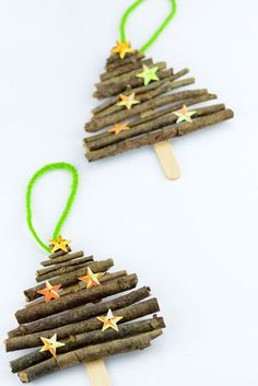 popsicle christmas tree craft for kids to make with sticks and colored star stick ornaments