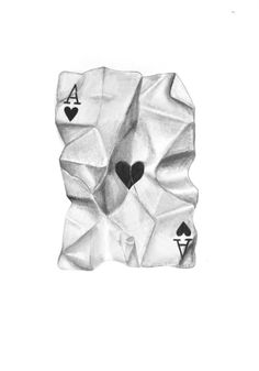 an origami bear with playing cards on it's back and two hearts in the middle