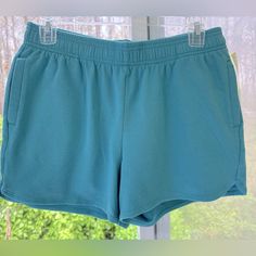 Beautiful Turquoise Shorts With Slanted Side Pockets. Cotton 95%, Spandex 5%. Length 12” Inseam 3.5” Rise 10” Waist 28” Plus Stretch Cold Water Wash, Cool Dry. Blue Athleisure Shorts With Ribbed Waistband, Athleisure Jogging Shorts, Casual Sports Season Jogging Shorts, Short Relaxed Fit Athleisure Activewear, Casual Short-leg Jogging Bottoms, Relaxed Fit Short Athleisure Activewear, Athleisure Bottoms For Jogging, Short Length, Athleisure Activewear With Relaxed Fit Shorts, Athleisure Activewear With Relaxed Fit And Short Shape