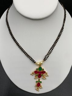 Multicolor Stones with Pearls pendant with double line black Diamond Beads Chain Handmade jewelry Silver plated jewelry One gram gold jewelry Official Website globusfashions.com 🌸 S H O P . M O R E . S T Y L E S 🌸 https://www.etsy.com/shop/Globusfashions Necklaces - https://www.etsy.com/shop/Globusfashions?section_id=18712263 Bracelets - https://www.etsy.com/shop/Globusfashions?section_id=18969767 Pendant Sets - https://www.etsy.com/shop/Globusfashions?section_id=18707402 Tikka - https://www.e Pearl Jhumkas, Black Beads Chain, Black Diamond Beads, Jumka Earrings, Pendant Sets, Chandbali Earrings, Beads Chain, Satin Bags, Silver Jewelry Handmade