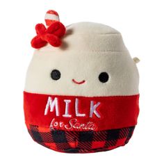 a close up of a stuffed animal with a bow on it's head and the words milk for santa