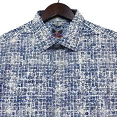 Description: * Robert Graham Men's Long Sleeve Button Front Shirt Jaskier Blue Geometric Flip Cuff * 98% Cotton, 2% Spandex * Size Large, Classic Fit (Please See Measurements In The Description Before Purchasing) * Made In India * New With Tags Measurements: * Sleeve Length (Shoulder Seam To Cuff): 9 1/2 Inches * Chest (Armpit To Armpit): 23 1/2 Inches * Length (Base Of Back Collar To Bottom Edge): 31 Inches Navy Slim Fit Shirt For Summer, Designer Summer Shirt With Button Closure, Designer Fitted Button-up Shirt, Summer Shirt With Fold Down Collar And Placket, Summer Shirt With Placket And Fold Down Collar, Blue Dress Shirt With Button Cuffs For Spring, Designer Spring Shirt With Buttons, Casual Fitted Dress Shirt For Fall, Fitted Casual Dress Shirt For Fall