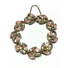 Vintage Pink Rhinestone Crystal Bracelet. Gold tone bracelet with pink glass and rhinestone design. Fold over clasp with safety chain. Vintage bracelet. JH37H. Rose Vintage, Safety Chain, Vintage Bracelet, Bracelet Vintage, Rhinestone Designs, Rhinestone Bracelet, Pink Rhinestones, Crystal Bracelet, Bracelet Gold