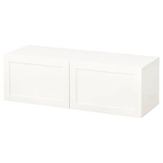 a white storage cabinet with two doors