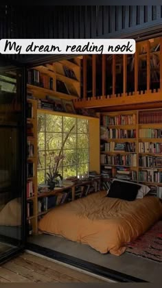 a bed sitting inside of a bedroom next to a book shelf filled with books on top of it