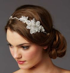 a woman wearing a bridal hair piece