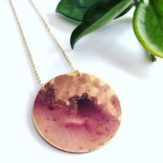 Oxidized brass metal with shades of pink and gold patina.  Hangs from 16” gold-filled chain.  Measures ~ 2”.**shades of color will vary due to the patina process.  The product pictured is a sample of what you will receive.**Handmade in the USAssd jewelry ©️ 2018 Gold Pendant Necklace With Patina, Bohemian Gold Necklace With Patina, Unique Rose Gold Round Necklace, Patina Round Pendant Necklaces For Gift, Patina Round Pendant Necklace For Gift, Round Pendant Necklace With Patina For Gift, Gold Patina Pendant Jewelry, Gold Brass Necklaces With Patina, Nickel-free Rose Gold Copper Necklace