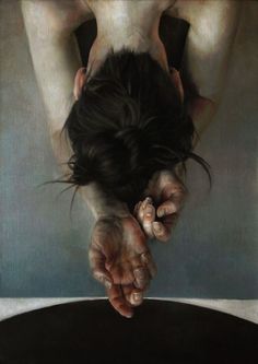 a painting of a woman's head and hands on top of a table