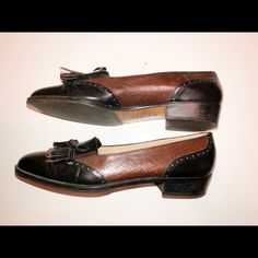 Classic Women’s Black And Brown Ferragamo Shoes Brown Calf Leather Tassel Loafers With Round Toe, Black Tassel Loafers With Almond Toe And Leather Lining, Black Leather Tassel Loafers With Almond Toe, Black Tassel Loafers With Rubber Sole In Calf Leather, Black Cap Toe Loafers For Galas, Elegant Black Tassel Loafers With Leather Lining, Black Calf Leather Tassel Loafers With Rubber Sole, Black Calf Leather Tassel Loafers With Leather Sole, Black Calf Leather Tassel Loafers For Galas