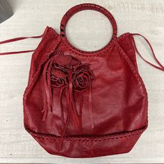 Beautiful Red Leather Bag, Medium Size, Never Worn, Not Sure What Brand It Is, Doesn’t Have Any Tags. Has A Zip Pocket Inside. Beautiful Stitching All Around. Faux Horn Handles Wrapped In Leather. Red Leather Bag, Womens Tote Bags, Lady In Red, Red Leather, Inside Pocket, Medium Size, Horn, Leather Bag, Zip Pockets