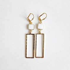 Designed to be super lightweight and comfortable to wear, with plenty of statement. MATERIAL: Brass CLOSURE: Gold plated leverback LENGTH: 2.75" long Chic Rectangular Metal Jewelry, Rectangular Gold Jewelry For Summer, Gold Rectangular Jewelry For Summer, Rectangular Gold Summer Jewelry, Trendy Hypoallergenic Rectangular Jewelry, Everyday White Rectangular Earrings, Modern White Rectangular Earrings, Rectangular Metal Earrings For Everyday, Chic Rectangular Everyday Earrings