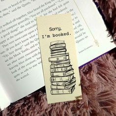 bookmark photographed on top of an opened book Cute Simple Bookmark Designs, Bookmarks Inspired By Books, Hand Made Bookmarks, Cute Bookmark Designs, Cool Bookmark Ideas, Bookmarks Handmade Easy, Bookmarks Handmade Watercolor