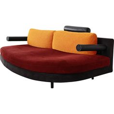 a red and black couch with two pillows on it's back end, sitting in front of a white background