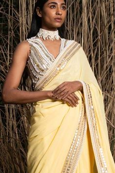 Yellow georgette saree with pearl and sequin embroidered border. Comes with unstitched blouse fabric.
Components:2
Pattern:Embroidery
Type of Work:Sequin and Pearl
Fabric:Georgette
Color:Yellow
Other Details:
Occasion:Mehendi and Haldi,Sangeet - Aza Fashions Traditional Georgette Pre-draped Saree With Pearl Embroidery, Georgette Blouse With Gota Work, Georgette Pre-draped Saree With Gota Work, Pre-draped Georgette Saree With Gota Work, Traditional Fitted Pre-draped Saree With Pearl Embroidery, Traditional Semi-stitched Pre-draped Saree With Pearl Embroidery, Diwali Saree Blouse Piece With Pearl Embroidery, Diwali Blouse Piece With Pearl Embroidery For Saree, Georgette Pre-draped Saree With Gota Work For Reception