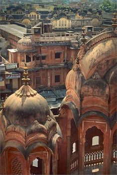 an aerial view of the city with many buildings and domes on it's sides