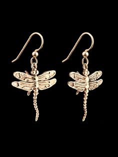 "This pair of detailed Dragon Fly earrings hover gracefully beneath your ears! They are cast in solid 14K gold and have a 1\" wing span. Sturdy 14K gold French Hook Ear Wires are included in the price. This item usually ships the same or next business day. All Marty Magic Jewelry is packaged in a beautiful box, embossed with the gold foil Marty Magic dragon logo. Perfect for any occasion! Designed in Santa Cruz California by Marty Magic. Made in the U.S.A." Elegant Hypoallergenic Dragonfly Earrings, Nickel-free Gold Dragonfly Jewelry, Elegant Dragonfly Earrings With Ear Wire, Elegant Sterling Silver Dragonfly Earrings, Gold Dragonfly Earrings For Gift, Elegant Dragonfly Jewelry With Ear Wire, Elegant Gold Dragonfly Jewelry, Nickel-free Gold Dragonfly Earrings, Gold Nickel-free Dragonfly Earrings