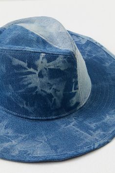 Make a bold statement with this jean-adorned cowboy hat. **Features:** Semi-structured style, washed jean fabrication, dipped crown, wide upturned brim, paneled construction **Why We | Kayce Indigo Cowboy Hat by Free People in Blue Blue Washed Bucket Hat, Blue Denim Sun Hat With Curved Brim, Blue Washed Hat With Curved Brim, Blue Curved Brim Sun Hat For Rodeo, Summer Denim Hat In Medium Wash, Denim Blue Brimmed Hat For Beach, Blue Denim Brimmed Hat, Denim Blue Brimmed Beach Hat, Wide Brim Blue Sun Hat For Rodeo