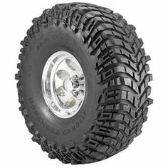 an all terrain truck tire with chrome spokes