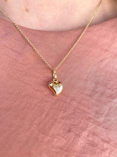 Delight your sweetheart (or yourself) with the gift of this 3D heart pendant made from luxurious 14K Yellow Gold. This pendant suspends from a 16-inch chain that secures with a spring-ring clasp. This style is both simple & striking that can be worn on the daily. Effortlessly chic, a timeless necklace that you can also stack up what your favorites!! Metal: Real 14K Yellow Gold (Stamped) Closure of Necklace: Spring- Ring Clasp Heart Pendant Dimensions: Small: approx. Width: 0.7 Height: 0.9 cm 14k Gold Heart Necklace With Diamond Cut For Gift, Diamond Cut Yellow Gold Heart Necklace Gift, Anniversary Yellow Gold Heart Charm Necklace, Mother's Day Hallmarked Heart Pendant Necklace, Yellow Gold Heart Charm Necklace For Anniversary, Yellow Gold Heart Cut Heart Necklace For Anniversary, Anniversary Heart Charm Necklace With Heart Cut, Yellow Gold Heart Cut Necklace For Anniversary, Heart-shaped Yellow Gold Charm Necklaces For Anniversary