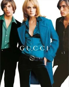 three young women standing next to each other in front of a white background with the words gucci on it