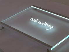 an illuminated table with the words not - nothing on it