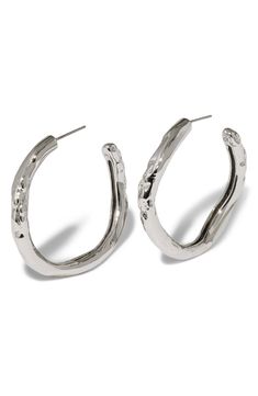 These modern hoop earrings feature a molten, sculptural silhouette that catch the light from every angle. 1 1/2" drop; 1/4" width Post back 14k-gold plate or sterling silver plate Imported Modern Hoop Earrings, Tube Hoop Earrings, Platform Slippers, Alexis Bittar, Maternity Shops, Kids Sandals, Fabric Gift Bags, Designer Clothes For Men, Modern Outfits