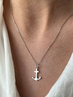 For the cute sailors and ocean lovers Get this beautiful minimalist jewelry made with the quality of perfect elements✨ You can choose 925K Sterling Silver with the options of Gold, Rose Gold or White Gold colors. High quality jewelry for everyone ❤️  Details * 925K Sterling Silver Option → 18K Gold, Rose Gold or White Gold plated * Chain length is 18 inches / 45 cm * Time is everything! You will receive your package as soon as possible 🚚  * We care about the quality of metal to make sure it will last for a long time * We use enamel technique to color the jewelry and high quality zircons only * There can be tiny differences on each item. Color changes and shade differences of the stones and enamel is possible since each jewelry piece is unique and special * That beautiful piece will add ex White Nautical Jewelry For Gift, Everyday Nautical Anchor Jewelry, Nickel-free Sterling Silver Anchor Jewelry, Nickel-free Anchor Shaped Sterling Silver Jewelry, Everyday Silver Anchor Jewelry, Everyday Silver Jewelry With Anchor Shape, Nautical Sterling Silver Necklace As Gift, Nautical Sterling Silver Necklace Gift, Nautical Sterling Silver Necklace For Gift