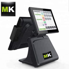 an electronic device that is sitting on top of a stand with the m & k logo