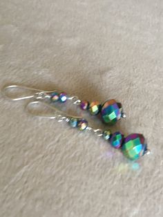 "Very sparkly glass beads rainbow colors, mermaid style, made with Hypoallergenic silver stainless steel dangling 2\" long earrings. Hand made jewelry All purchase will arrive in gifts boxes Thanks for stopping by!" Gifts Boxes, Metallic Rainbow, Beads Earrings, Mermaid Style, Rainbow Beads, Made Jewelry, Ear Rings, Mermaid Fashion, Hand Made Jewelry