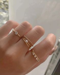 Product Description Simple stacker ring with a lot of sparkles! Made in 14k gold fill and is tarnish-resistant, showerproof, and safe for sensitive skin. Just keep it away from chemicals such as hand sanitizer, soap, and lotion for a longer life span. …………………………………. D E T A I L S • Available from US 5 to 10• Band measures 1mm• Keep away from chemicals such as lotion, soap, and hand sanitizer• Tarnish-resistant, waterproof, and safe for sensitive skin • 100% 14K Gold Filled • Build your ring stac Cute Rings Aesthetic Simple, Mum Diy, Pearl Stacking Ring, Dainty Gold Jewelry, Dainty Rings, Stacker Rings, Gold Rings Simple, Dainty Gold Rings, S Jewelry