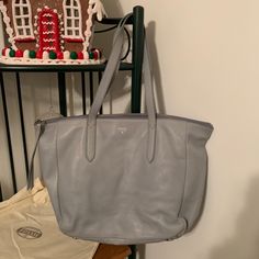 Beautiful Blue-Gray Fossil Tote. New Without Tags. Great Condition, Never Worn. Gray Shoulder Bag With Silver-tone Hardware For Everyday Use, Gray Everyday Bags With Silver-tone Hardware, Gray Bags With Silver-tone Hardware For Daily Use, Light Blue Bag With Silver-tone Hardware For Everyday Use, Light Blue Bags With Silver-tone Hardware For Everyday Use, Fossil Purse, Teal Leather, Fossil Bags, Straw Tote Bag