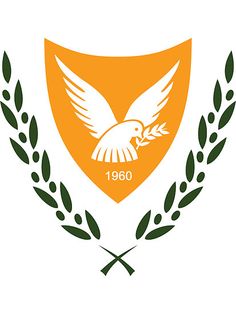 an emblem with two green leaves and a white bird on it's head, in front of a yellow shield