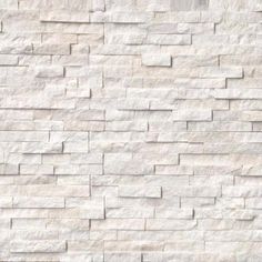 a white brick wall is shown in this image