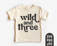 a t - shirt with the words wild and three printed on it in black ink