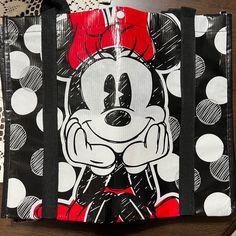 From The Disney Store Brand New Set Of Two Minnie Mouse Shopping Bags Or Everyday Use. Also Collectable Bags. These Bags Have A Snap Closure And Cardboard Bottom. Also Can Be Easy Wipe Cleaned Perfect For The Minnie Fan Size: 14.5 X 12.5 In Color: Black & Red Questions Just Ask Trendy Red Bags For Disney Trips, Disney Style Black School Bags, Trendy Minnie Mouse Bags For Daily Use, Disney Black School Bags, Cute Mickey Mouse Bags As Gift, Black Rectangular Bags With Character Print, Cute Mickey Mouse Bags For Gifts, Cute Minnie Mouse Bags For Everyday Use, Red Minnie Mouse Bag For Daily Use