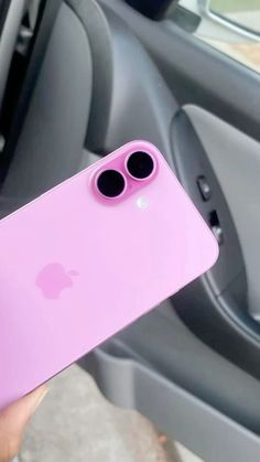 a person holding an iphone in their hand with the phone case on it's side