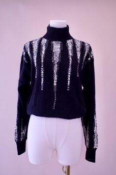 Vintage Semplice Silver Sequin and Beaded Sweater. 70% Lambswool, 20% Angora, 10% Nylon. Made in China. Size Medium. Some sequins and beads missing, see photos and video. Shoulders - 20" Armpit - 19" Sleeve - 25" Length - 24.5" This is a vintage item and therefore is previously owned and may show signs of wear or fading. We do our best to photograph and explain the condition that the item is in. Please keep in mind that vintage items are at least 20 years old and their pre-loved nature is what makes them so unique. Beaded Sweater, Silver Sequin, Pullover Sweater Women, Women Pullover, Sweater Sizes, Pullover Sweaters, 20 Years, Sweater Outfits, Favorite Outfit