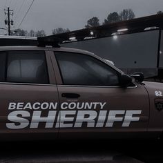 a truck with beacon county sheriff written on it