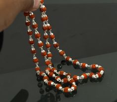 Sterling silver solid handmade natural rudraksh beads chain necklace .54+1 bead or rudraksh is use in this necklace, it use as japp mala, we pray to god 108 time for any wish.so this is half japp mala 23 inches long necklace. unisex jewelry form rajashthan india. Rudraksha is belong to god shiva. Metal-Sterling silverBrand-traditional-jewellery.Length-23 inchesWidth-5.5 mm approx.Weight-12.180 grams.Type- beaded necklace.Stone- Natural Rudrakshamakes excellent gifting and collectible pieces Silver Mala With Round Beads For Meditation, Silver Mala With 108 Beads As Gift, Spiritual Silver Beads Mala Gift, Spiritual Silver Mala With 8mm Beads, Silver Spiritual Mala For Puja, Silver Mala With Round Beads For Gift, Silver Mala For Festivals, Silver Mala With 108 Beads For Meditation, Silver Mala For Festival Gifts