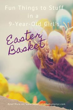 an easter basket with eggs and flowers in it