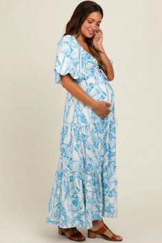 Blue Floral Cinched Tie Maternity Maxi Dress – PinkBlush Flowy Maternity Maxi Dress For Beach, Flowy Maxi Maternity Dress For The Beach, Flowy Maxi-length Maternity Dress For Beach, Flowy Maxi Length Maternity Dress For The Beach, Summer Beach Maternity Dress With Short Sleeves, Flowy Maternity Beach Dress, Summer Flowy Maternity Dress With Smocked Back, Casual Flowy Maternity Dress For Vacation, Casual Summer Maternity Dress With Ruched Details