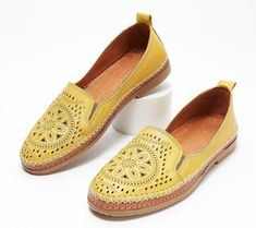 These leather slip-ons boast an intricately designed, perforated upper that demands attention. Whether you choose to wear them with your go-to jeans, a cute maxi dress, or shorts during those warm summer months, they're destined to radiate your sense of style for all to enjoy. From Spring Step. Leather Slip-ons With Woven Sole For Spring, Spring Flat Heel Slip-ons With Perforations, Summer Leather Slip-ons With Perforations, Leather Slip-ons With Perforations For Summer, Spring Slip-ons With Perforations And Flat Heel, Spring Perforated Flat Heel Slip-ons, Summer Leather Slip-ons, Yellow Slip-ons For Spring, Casual Yellow Slip-ons For Spring