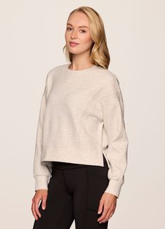 Our In The Studio Cropped Pullover combines a classic crewneck design and super soft, trendy scuba fabric for a lightweight pullover you can take from studio to street. A slightly cropped length is complemented by a relaxed fit, dropped shoulders and sporty seaming detail that allow for easy styling and layering. Throw this cute crop sweatshirt over a sports bra for a workout or pair it with jeans for a casual-cute look. Cropped Pullover, Scuba Fabric, Crewneck Design, A Workout, In The Studio, Crop Sweatshirt, The Studio, Drop Shoulder, Layering