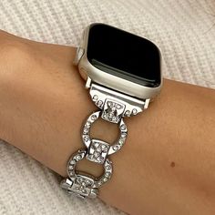 High Quality Shiny Silver Metal Links Bracelet With Cz Crystals For Apple Iwatch All Series 38mm 40mm 41mm 42mm 44mm 45mm Comfortable Luxury Wristband With Secure Clasp Adjustable Size Bracelet Fits 5.5 To 8 Inches Wrist Super Light Fashion Accessory Weighs 1.2 Oz, 18mm Wide Designed And Handmade By Simeon D Jewelry Studio Please Measure Your Wrist As Pictured Before Ordering Elegant Stylish Gift For Any Holiday Or Occasion Not For Other Models. Apple Smartwatch Is Not Included Follow My Studio Modern Silver Diamond Watch Accessories, Silver Diamond Watch With Bracelet Strap As Gift, Silver Watches With Rhinestones, Silver Bling Watch Bands As Gift, Luxury Silver Watch Bands With Bling, Silver Diamond Watch With Rhinestones, Silver Rhinestone Watches, Silver Apple Watch Band With Bracelet Strap, Elegant Silver Bracelet Strap Apple Watch Band