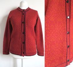 "Vintage knitted folkloric cardigan by Apleks. Made in Estonia. Pure wool. Ethnic rich geometric pattern jacquard knit in orange and red. Some accent lines in black. Long fitted style, crew neck, buttons down the front. Estimated size Small to Medium. Please check the measurements: armpit  ~ 92 cm  /  ~ 36 \" waist  ~ 88 cm /  ~ 34 \" length  ~ 62 cm  /  ~ 24 \" In great vintage condition with just a little wear - see last photo, there is slight surface fluffing in the back waist area. On the inner side some threads have been pulled in, but this does not affect the condition and looks." Traditional Red Cardigan For Winter, Traditional Red Winter Cardigan, Traditional Fair Isle Pattern Cardigan For Fall, Traditional Fair Isle Cardigan For Fall, Norwegian Style, Gauze Skirts, Peasant Skirt, Pleated Maxi Skirt, Stage Costume